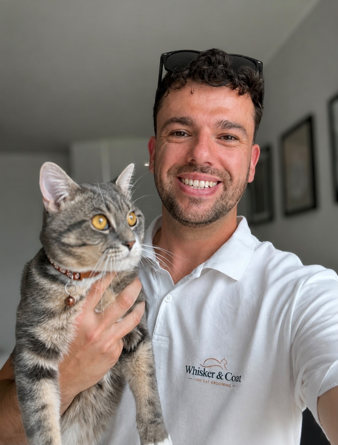 Whisker & Coat founder with a cat
